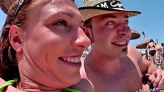 beach,bottle,couple,german,outdoor